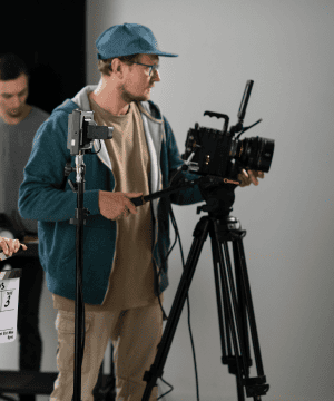 Cinematographer filming an event